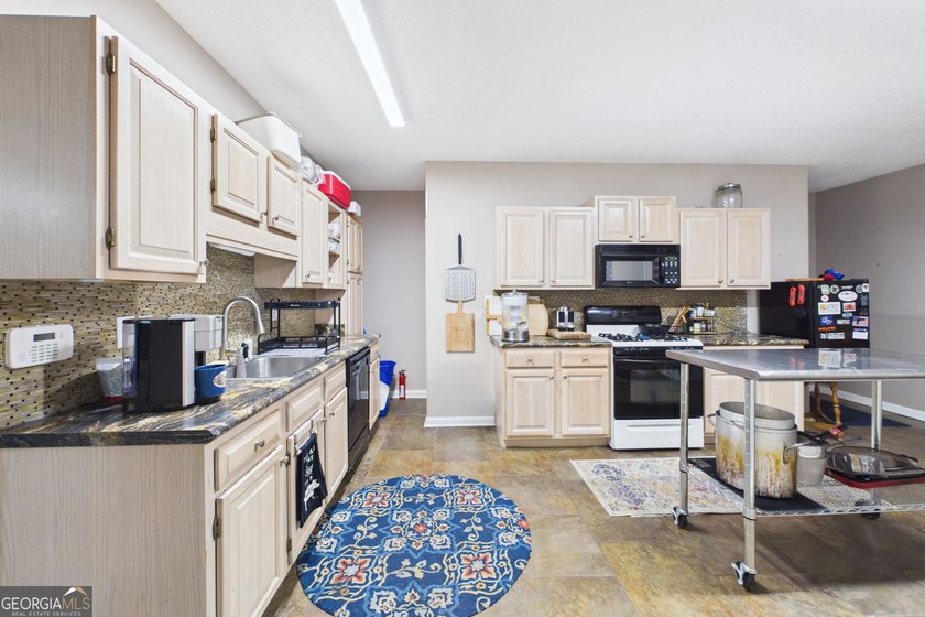 Welcome to this beautifully maintained home located in the - photo 29