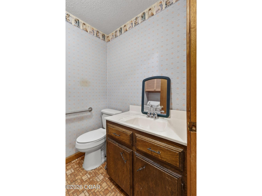 Welcome home to this solid 3-bedroom, 2.5-bath brick home - photo 31