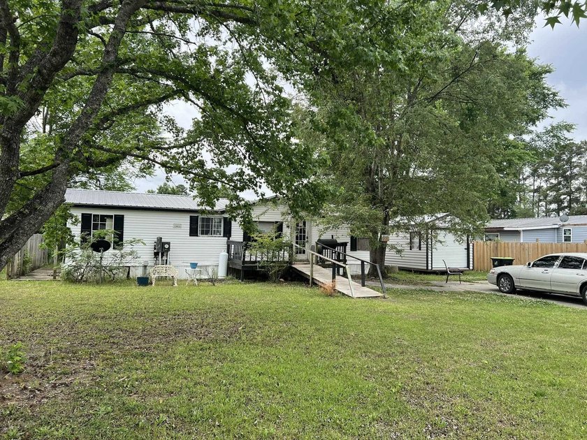 A Fixer Upper with lots of Potiential!! An ideal situation for - photo 2