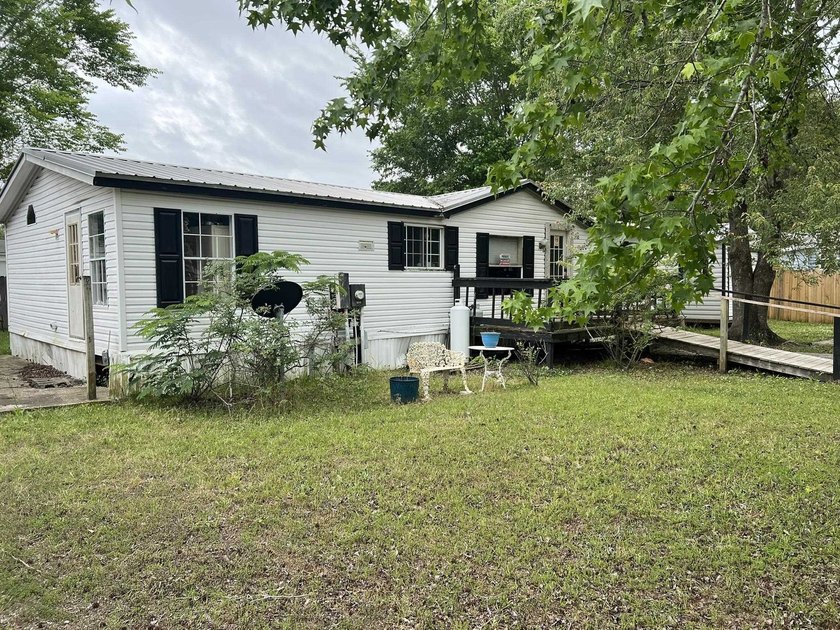 A Fixer Upper with lots of Potiential!! An ideal situation for - photo 3