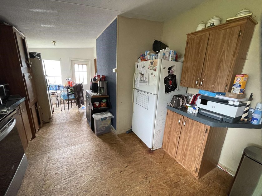 A Fixer Upper with lots of Potiential!! An ideal situation for - photo 7