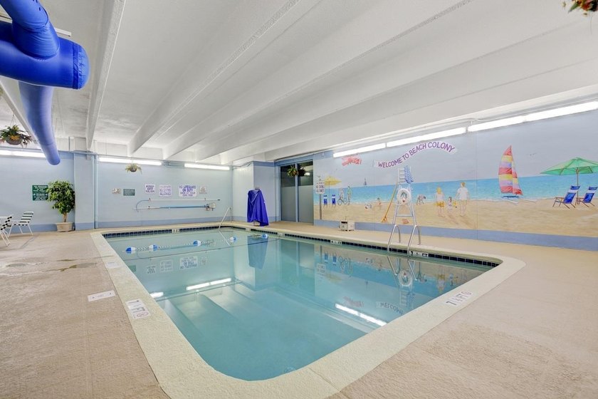 Welcome to Unit 207 at Beach Colony Resort, a charming 1-bedroom - photo 29