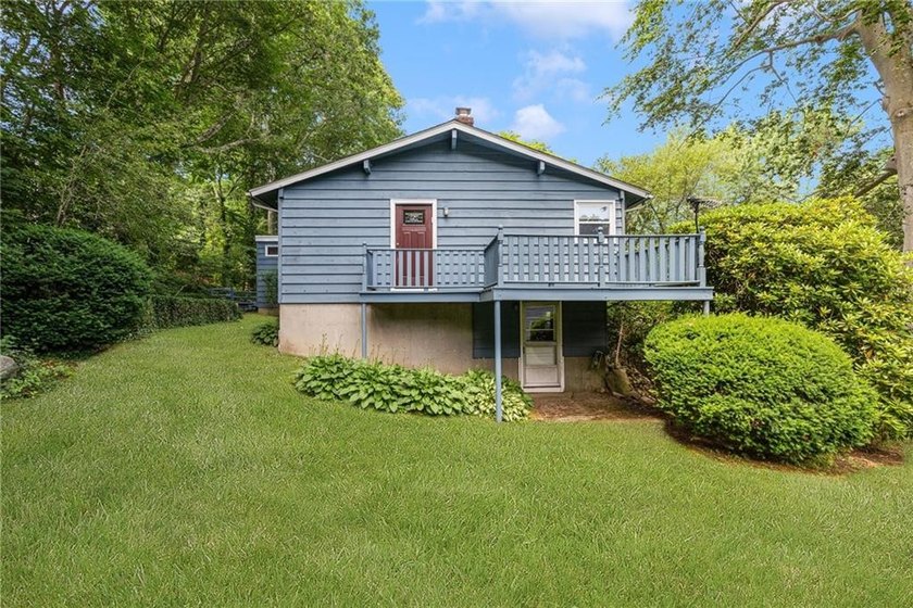 THIS OVERSIZED RAISED RANCH SITS IN A QUIET NEIGHBORHOOD IN - photo 2
