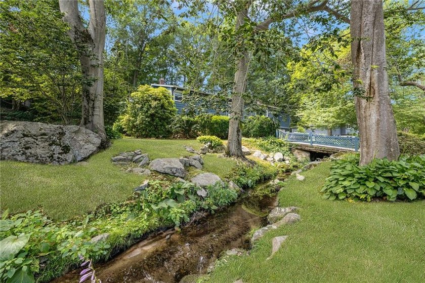 THIS OVERSIZED RAISED RANCH SITS IN A QUIET NEIGHBORHOOD IN - photo 4