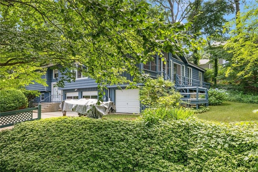 THIS OVERSIZED RAISED RANCH SITS IN A QUIET NEIGHBORHOOD IN - photo 6