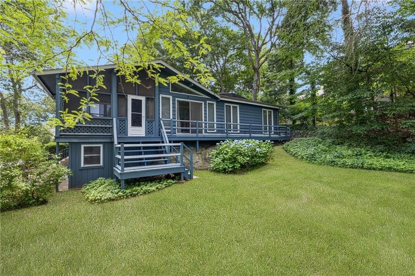 THIS OVERSIZED RAISED RANCH SITS IN A QUIET NEIGHBORHOOD IN - photo 7
