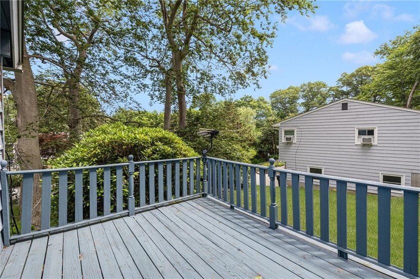 THIS OVERSIZED RAISED RANCH SITS IN A QUIET NEIGHBORHOOD IN - photo 9