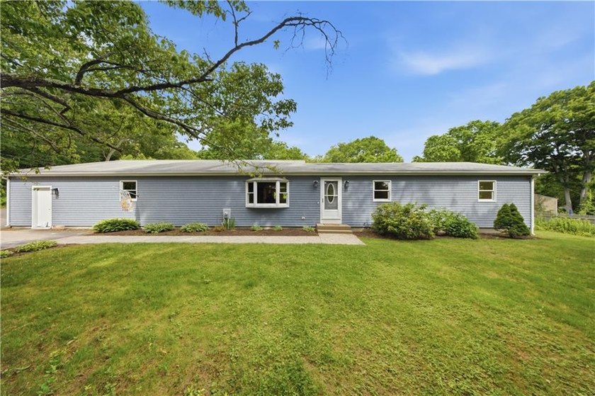 Situated on a one-acre lot along a private road, this - photo 3