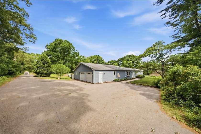 Situated on a one-acre lot along a private road, this - photo 4