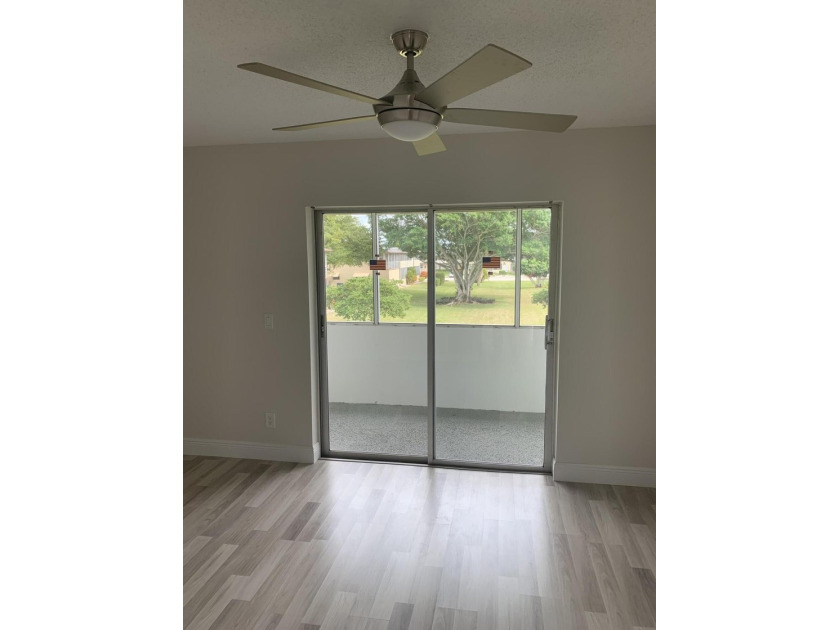 Fully remodeled unit on a quite tree lined street! Gated - photo 9