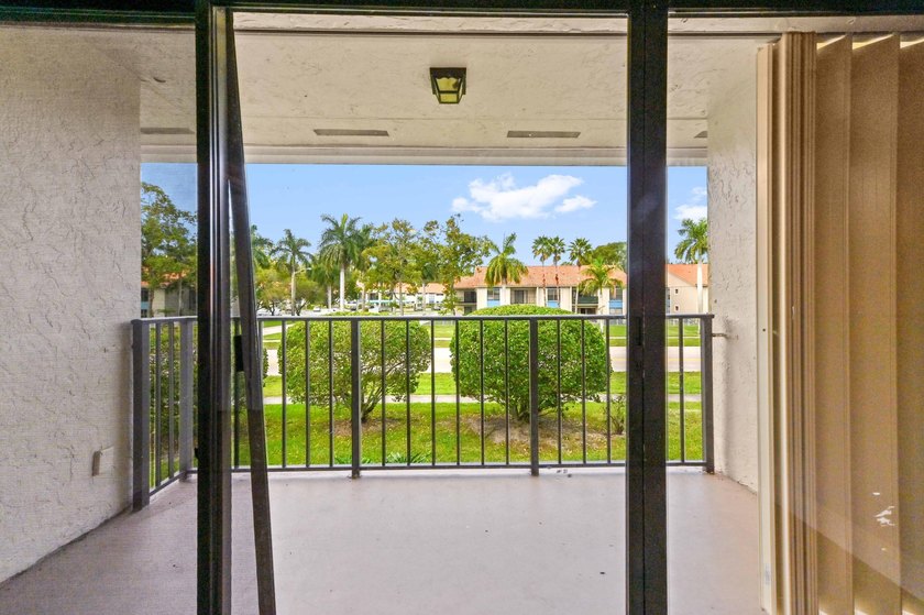 Step into this inviting 2-bedroom, 2-bath condo located in the - photo 2