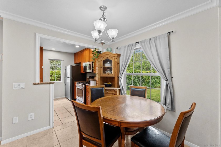 Welcome to this well-maintained first-floor condominium in the - photo 8