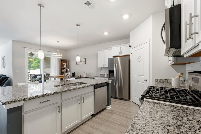 Welcome HOME to this exceptional residence in the highly - photo 3
