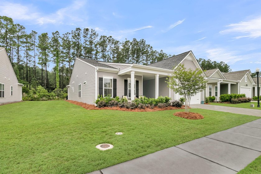 Under two-years old and impeccably-kept, this single level Mont - photo 3