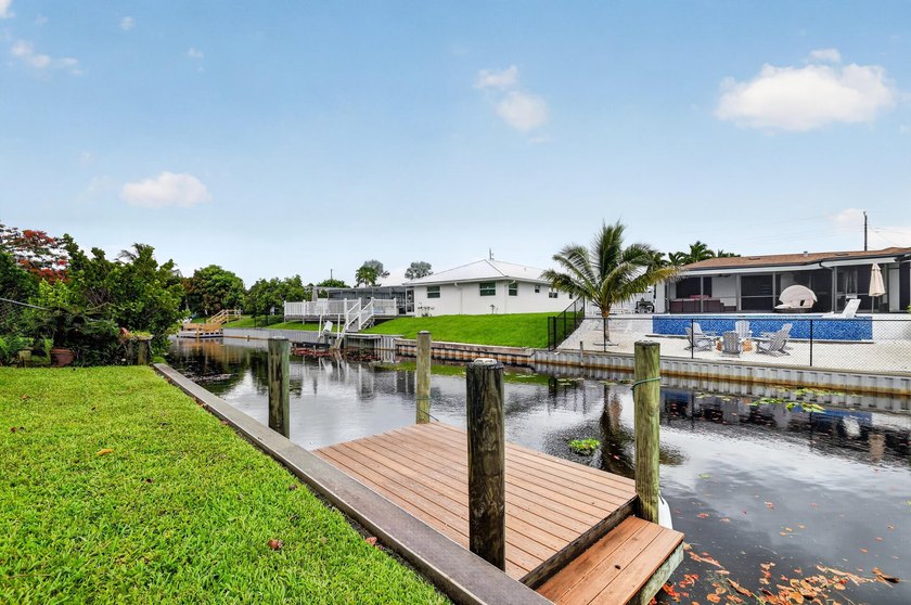 Nestled in the desirable community of Lake Clarke Shores, this - photo 12