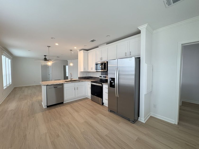 Welcome to Winds of St. Armands South, a premier 55+ - photo 3