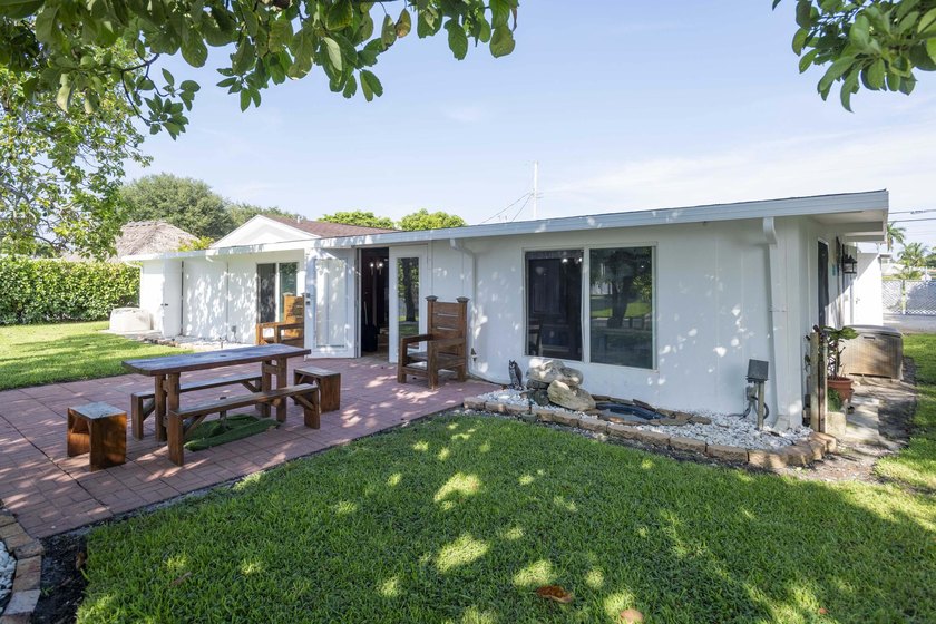 Nestled in the desirable community of Lake Clarke Shores, this - photo 18