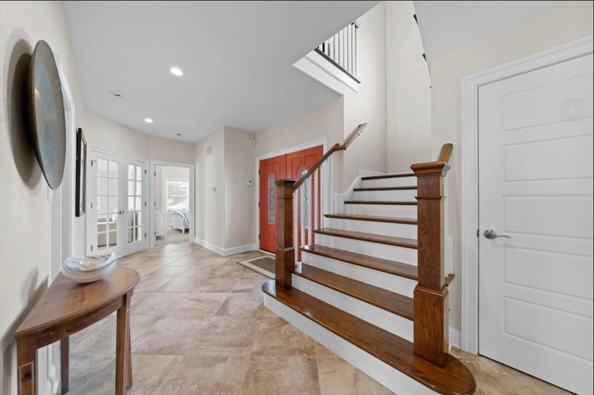 NEWLY RENOVATED!! - This Custom built four bedroom, three and - photo 15