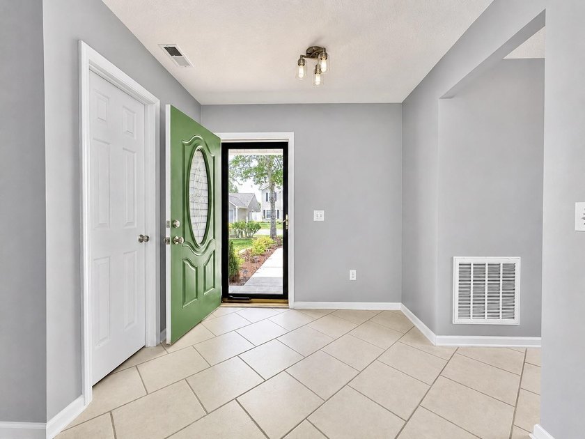 Welcome to 746 Pepperbush Drive, a beautifully updated 4-bedroom - photo 5
