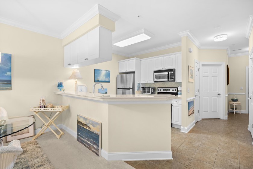 Your coastal getaway awaits at 703 Shearwater Court, Unit #304-a - photo 6