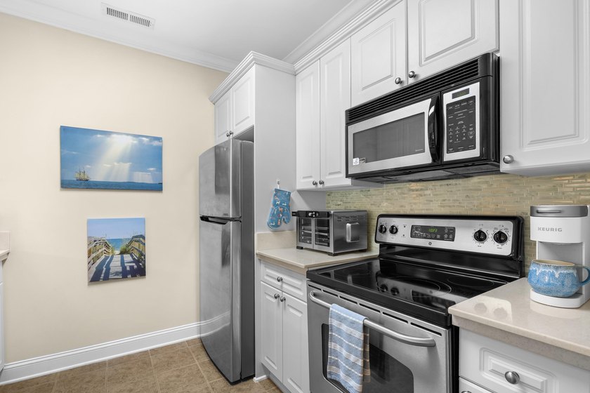 Your coastal getaway awaits at 703 Shearwater Court, Unit #304-a - photo 7