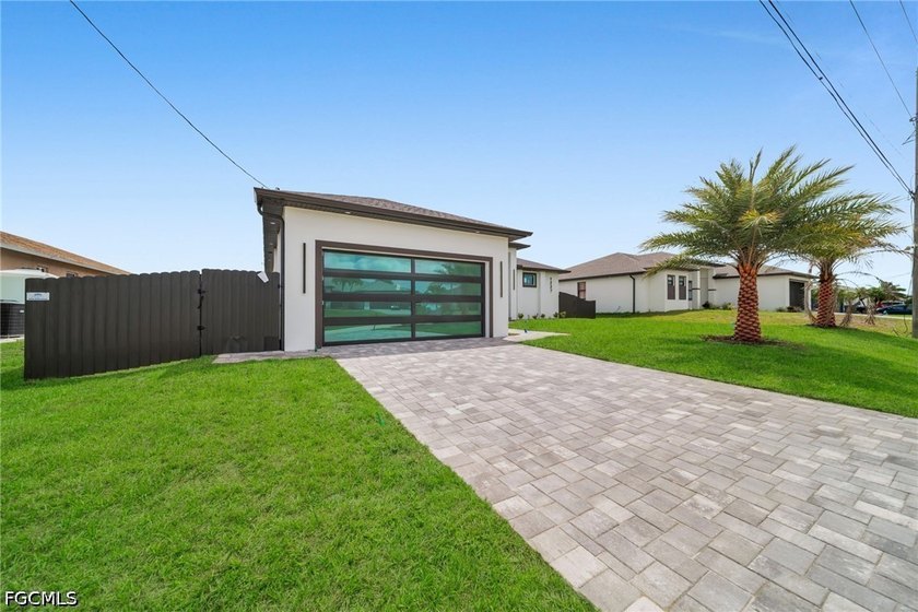 Step into modern Florida luxury in this brand-new 2026-built - photo 3