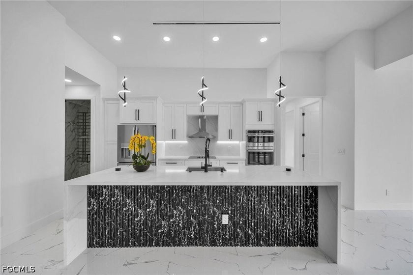Step into modern Florida luxury in this brand-new 2026-built - photo 8