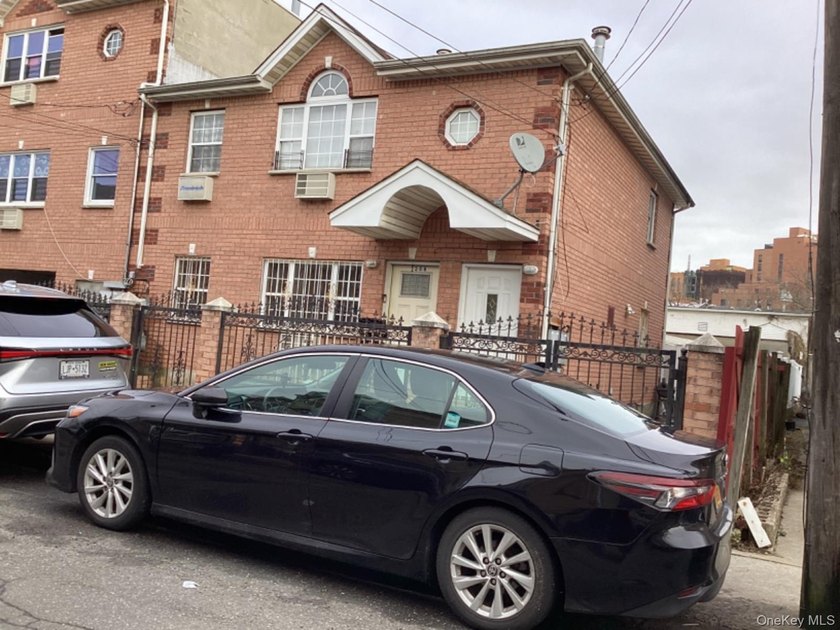 A rare find! This 19-year-young, brick-legal 2-family home is in - photo 3