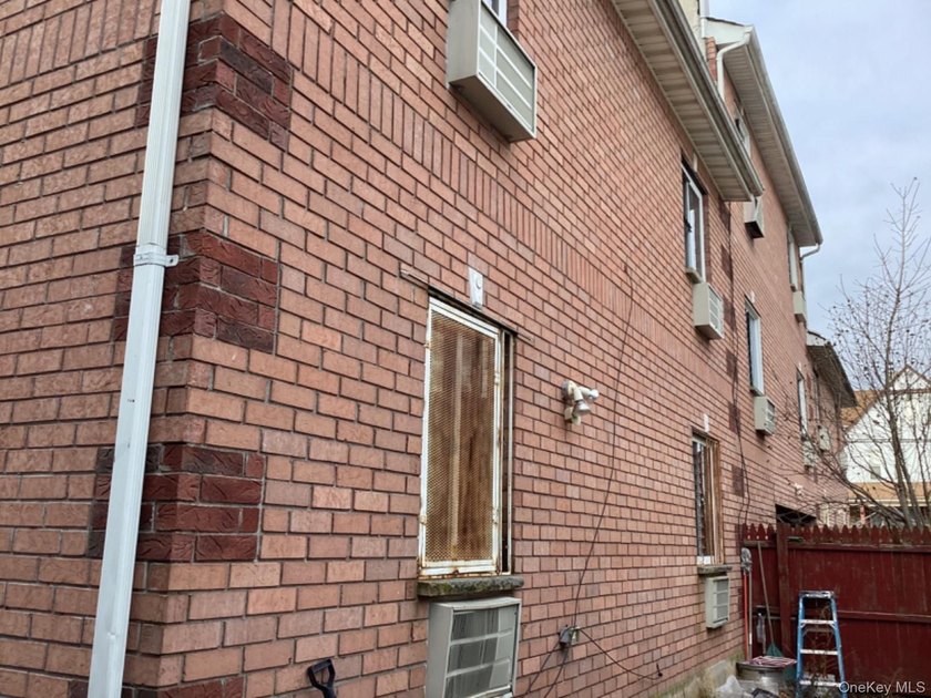 A rare find! This 19-year-young, brick-legal 2-family home is in - photo 5