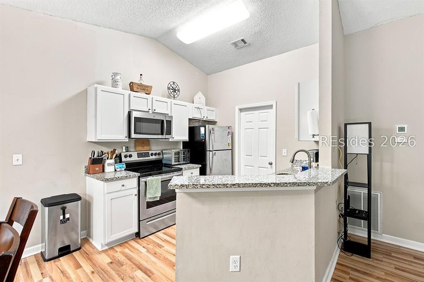 Welcome to this charming 4-bedroom, 2-bath home in the - photo 14