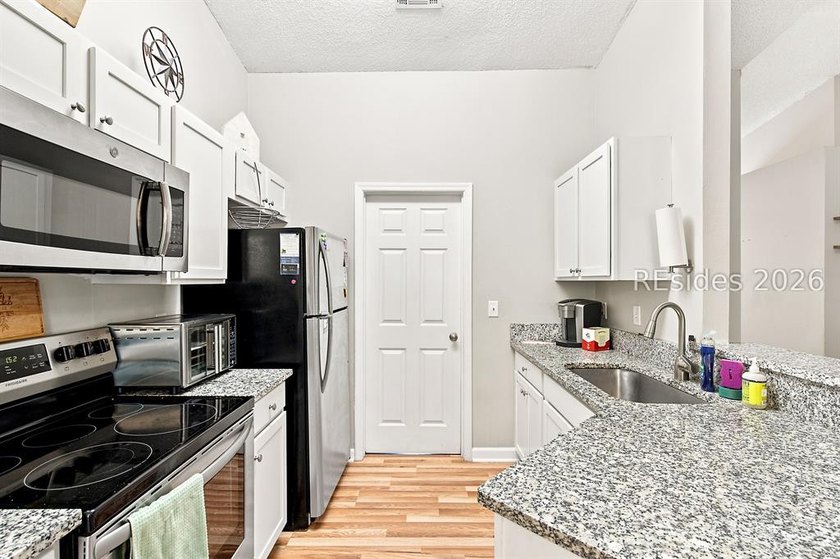 Welcome to this charming 4-bedroom, 2-bath home in the - photo 17