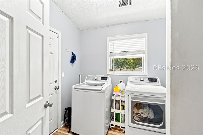 Welcome to this charming 4-bedroom, 2-bath home in the - photo 18