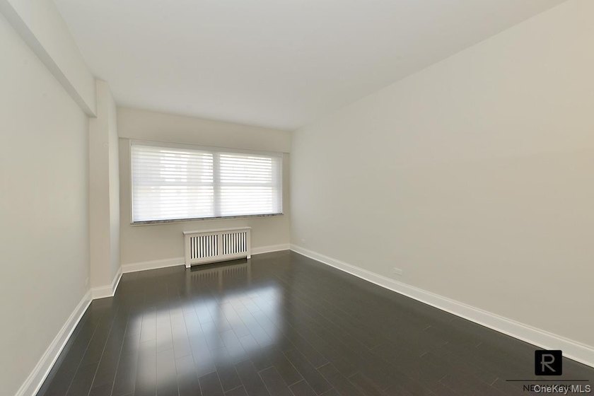 Step into sophisticated urban living in this stunning, barely - photo 8