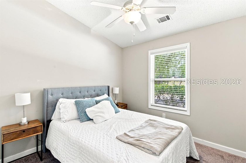 Welcome to this charming 4-bedroom, 2-bath home in the - photo 31