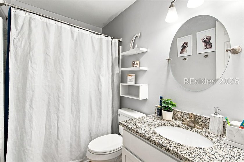 Welcome to this charming 4-bedroom, 2-bath home in the - photo 33