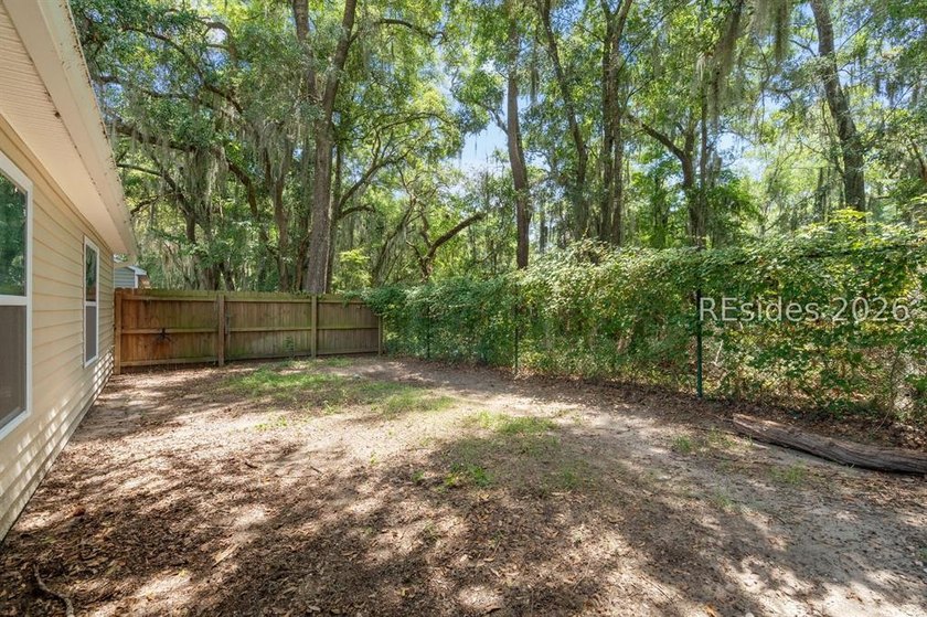 Welcome to this charming 4-bedroom, 2-bath home in the - photo 34