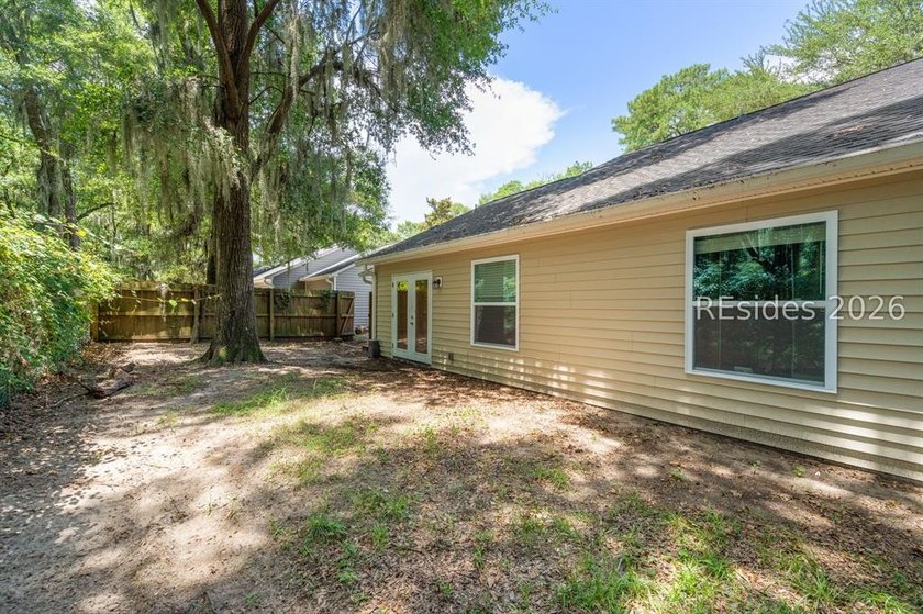 Welcome to this charming 4-bedroom, 2-bath home in the - photo 35