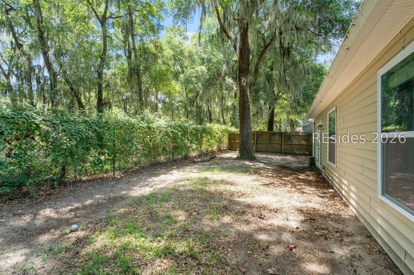 Welcome to this charming 4-bedroom, 2-bath home in the - photo 36