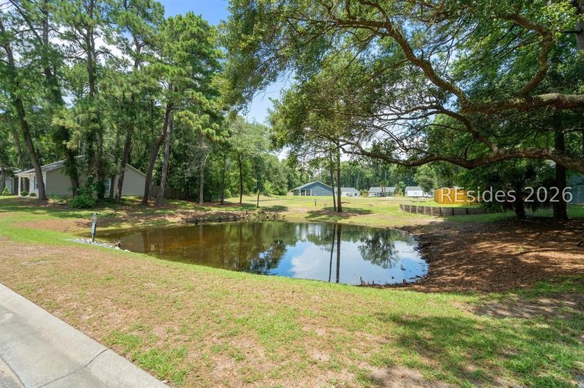 Welcome to this charming 4-bedroom, 2-bath home in the - photo 39
