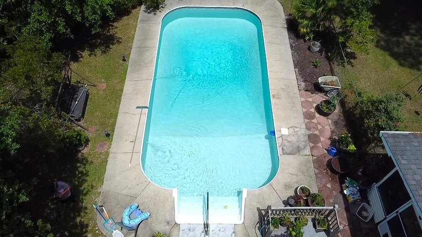LOCATION! PRIVATE BACKYARD OASIS!! IN-GROUND SALTWATER POOL!!! - photo 4