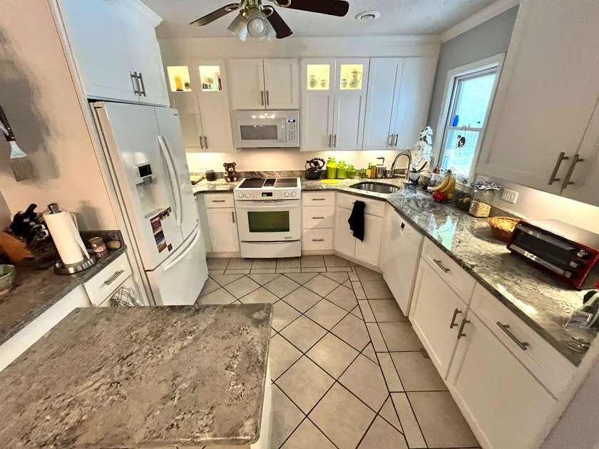 LOCATION! PRIVATE BACKYARD OASIS!! IN-GROUND SALTWATER POOL!!! - photo 6