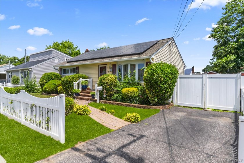 This charming 3-bedroom, 1-bath ranch offers comfortable - photo 2