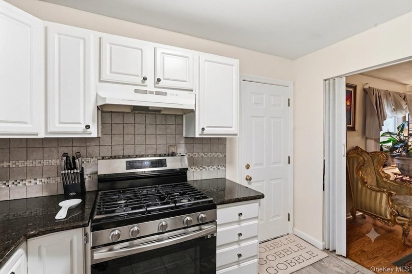This charming 3-bedroom, 1-bath ranch offers comfortable - photo 10
