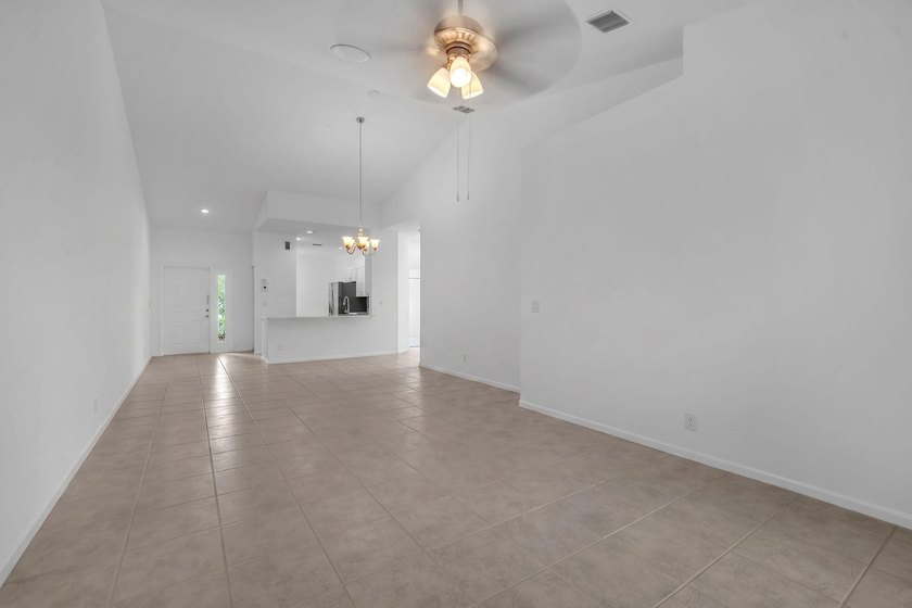 Welcome home to this beautifully updated villa in the highly - photo 11