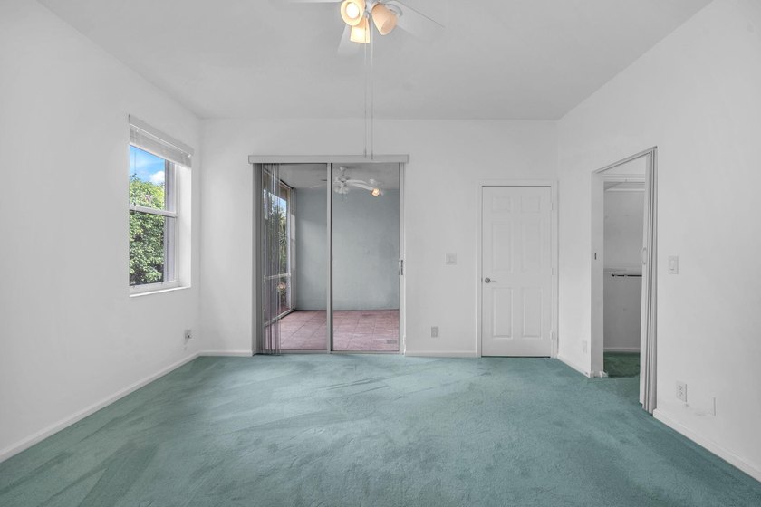 Welcome home to this beautifully updated villa in the highly - photo 14