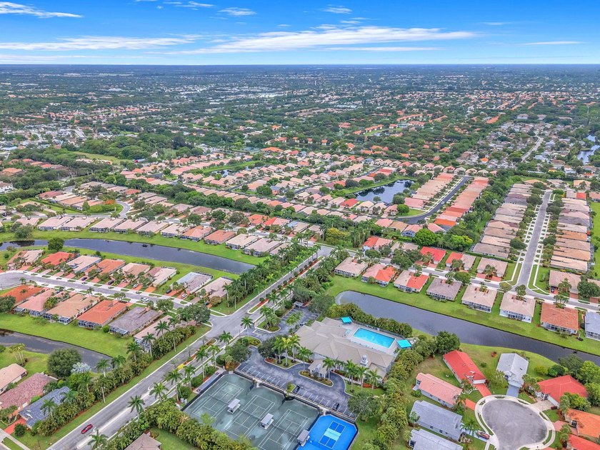 Welcome home to this beautifully updated villa in the highly - photo 27