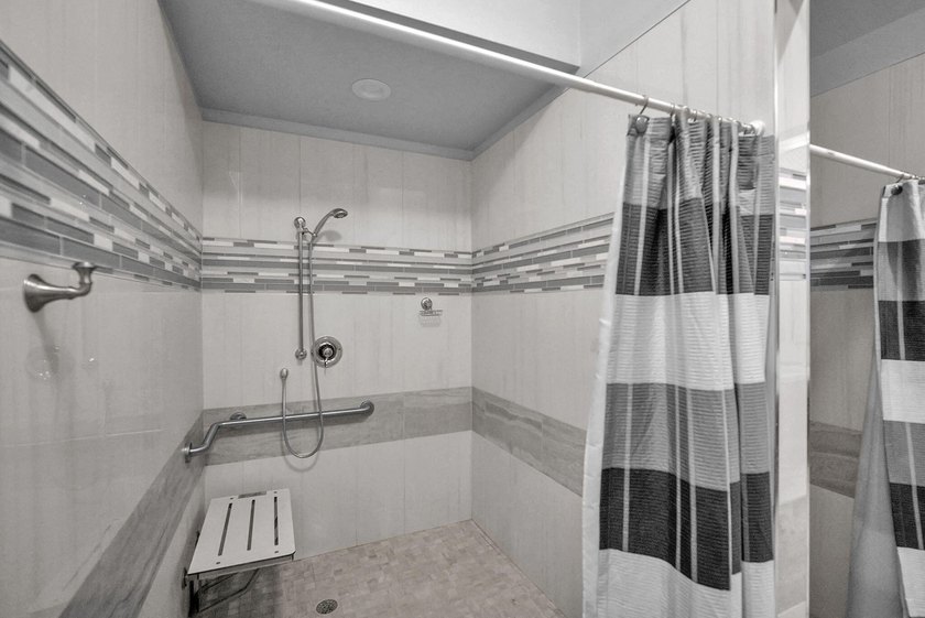 Welcome home to this beautifully updated villa in the highly - photo 41