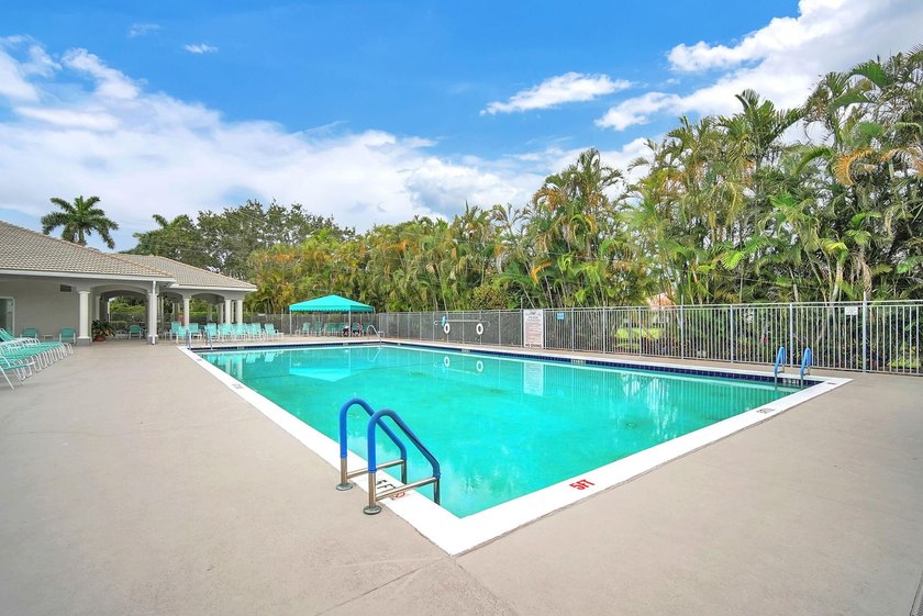 Welcome home to this beautifully updated villa in the highly - photo 42