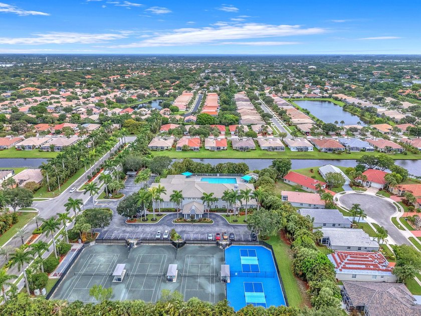 Welcome home to this beautifully updated villa in the highly - photo 50