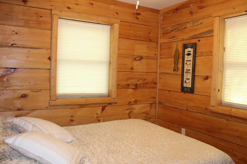 Located in the heart of the Northwoods on Moen Lake, this - photo 5